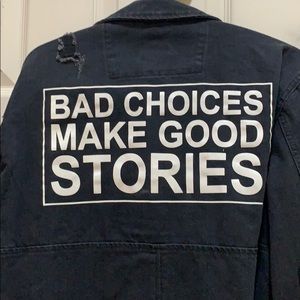 Distressed denim jacket with cool saying on back!